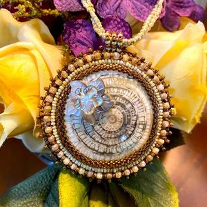 Hand beaded cabachon with beaded rope